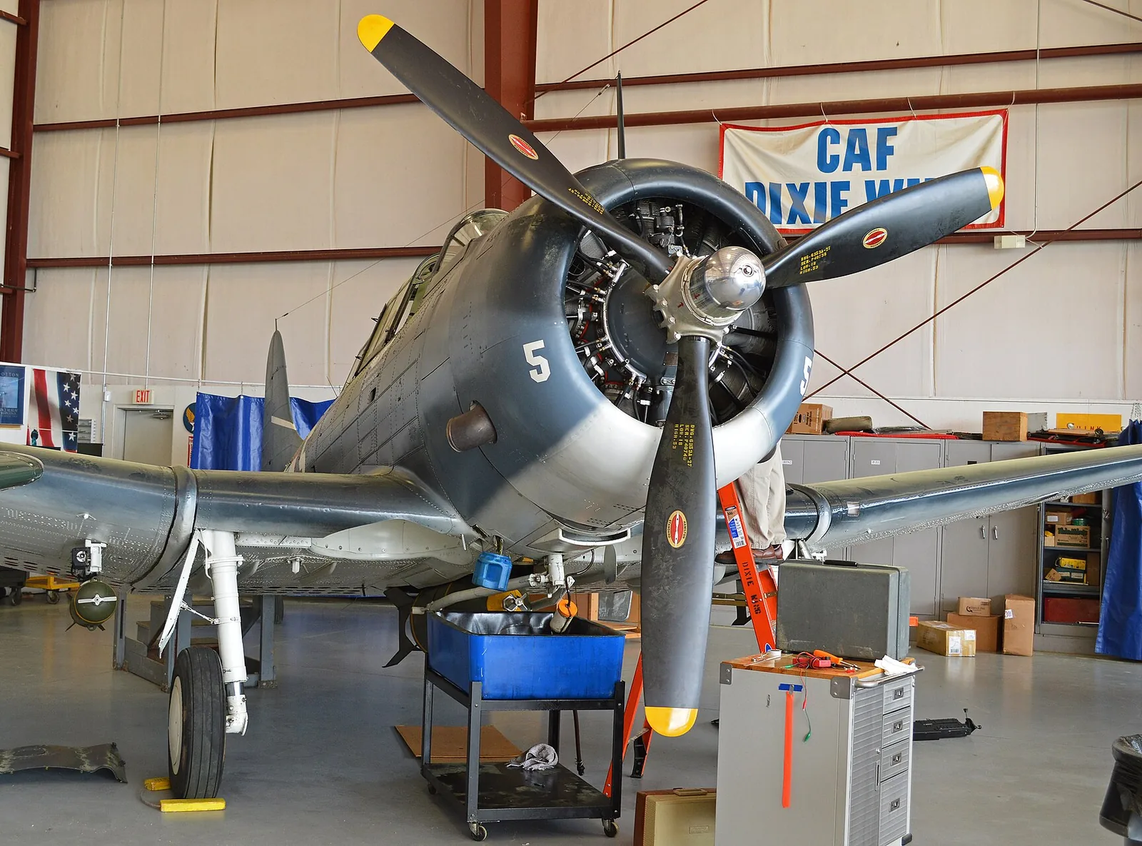 A World War II dive bomber in the Commemorative Air Force hangar at Airbase Georgia in Peachtree City, which hosts the Moonlight Swing dance