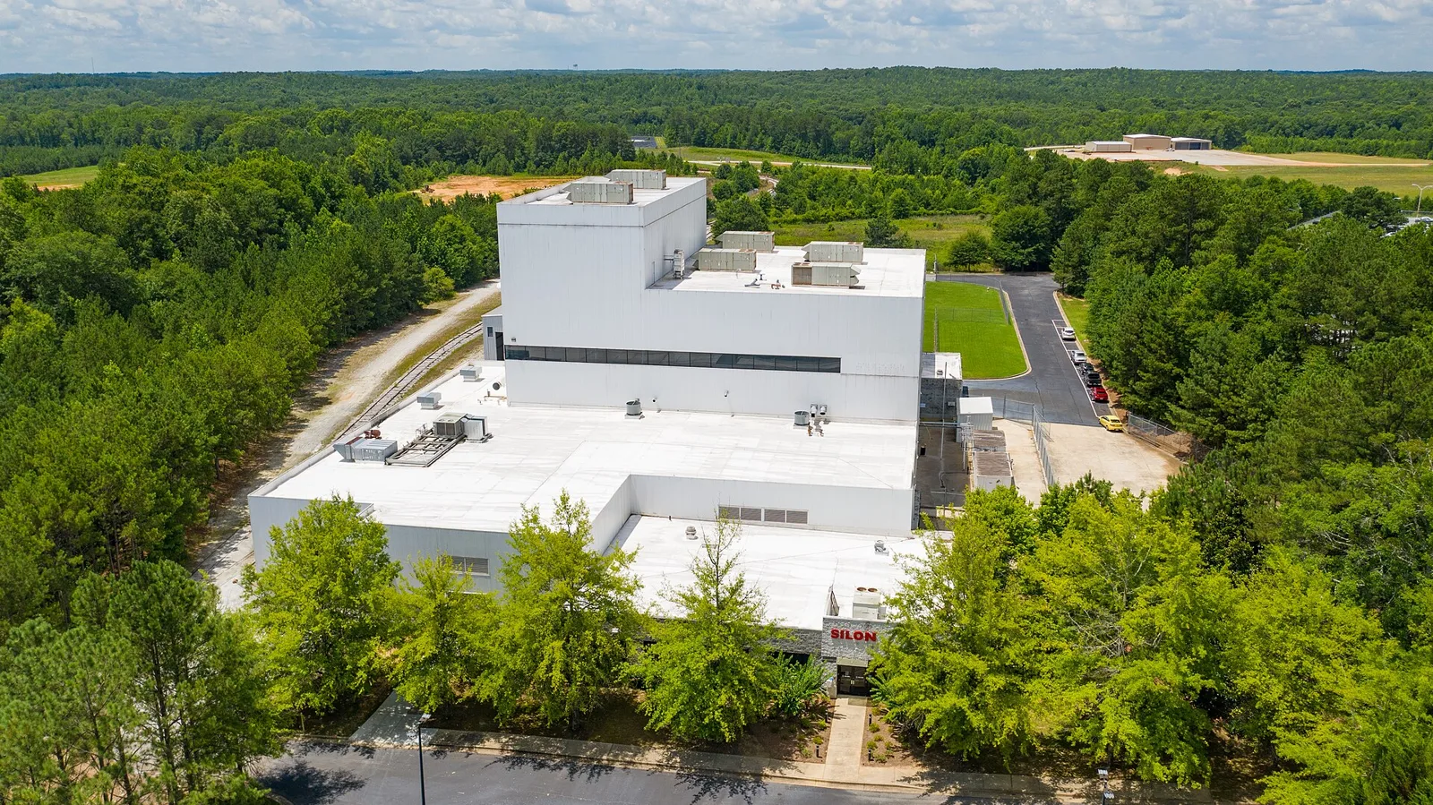 Aerial view of the Silon manufacturing plant in Peachtree City. The jobless figures count city residents, not workers at any one employer.